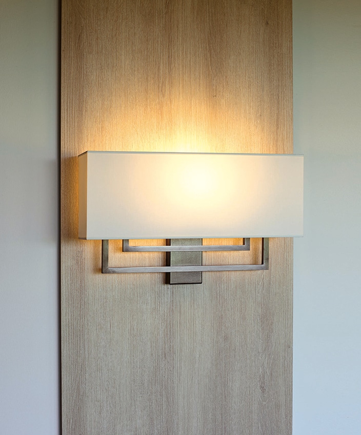designer wall lamp with mat gold patina finish